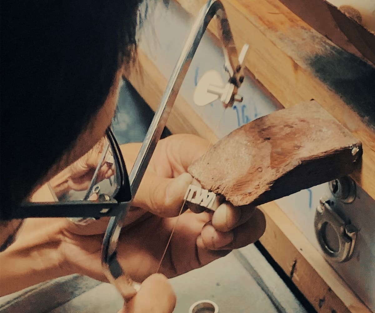 the worker make stainless steel name ring